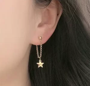 Gold Star Earrings Gold Star Jewelry on ear