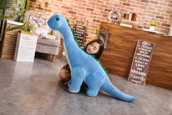 blue Trending Long Neck Dinosaur Stuffed Animal hugged by girl