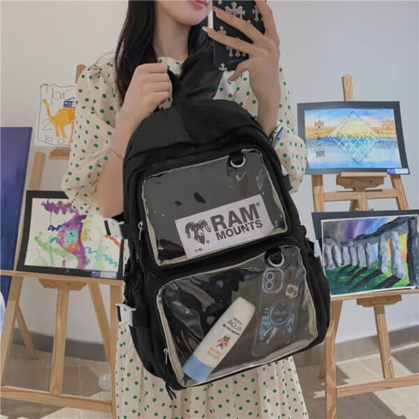 black pain bag with with clear panels on kawaii girl