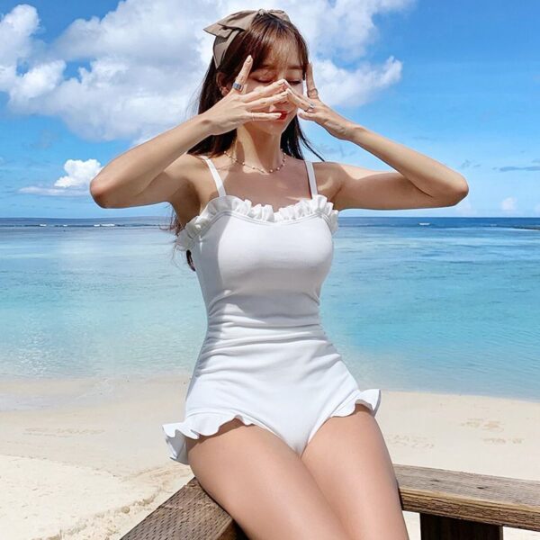 cute woman posing cutely with simple One Piece Swimsuit