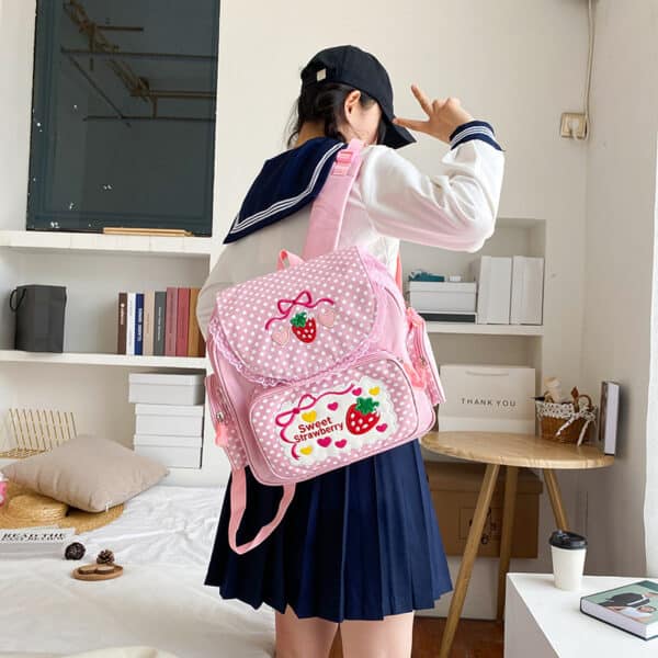 schoolgirl wwearing big kawaii Strawberry Backpack