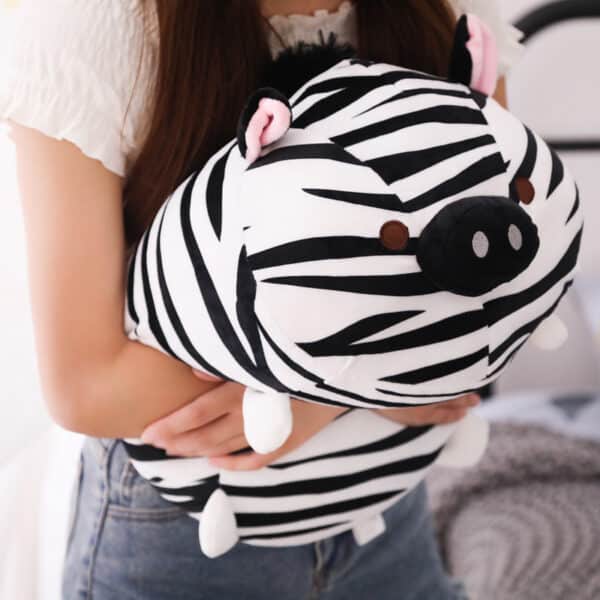 zebra Plushie held by woman