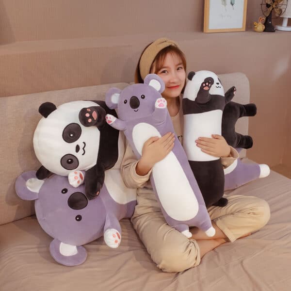 girl cuddling with Koala Plushie