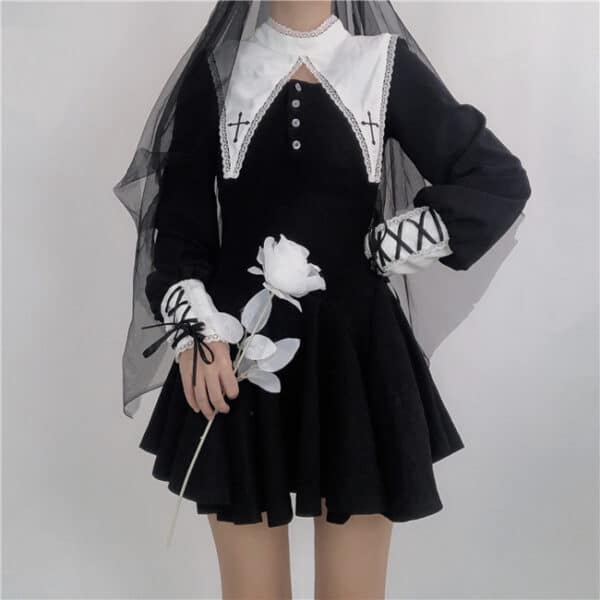 girl wearing nun dress costume holding white rose