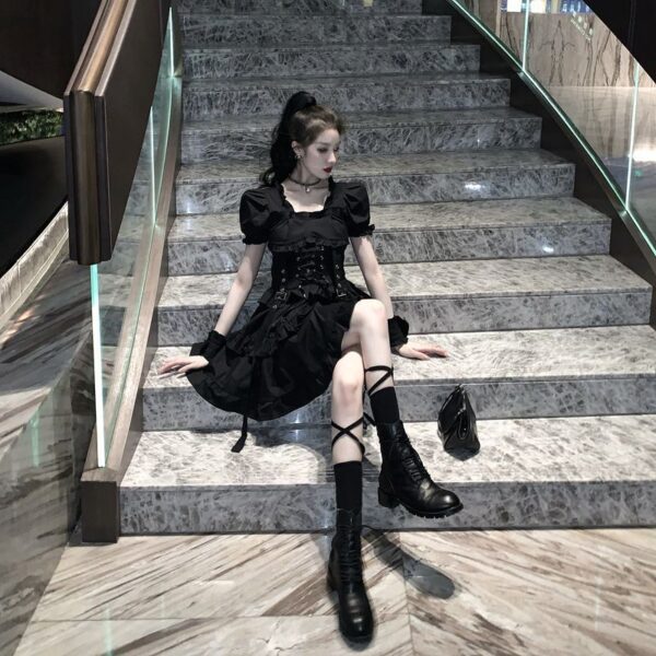beautiful girl sitting on stairs wearing a Short Corset Dress black