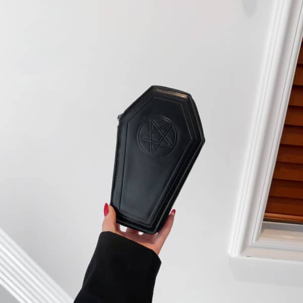 goth girl holds pentagram gothic wallet