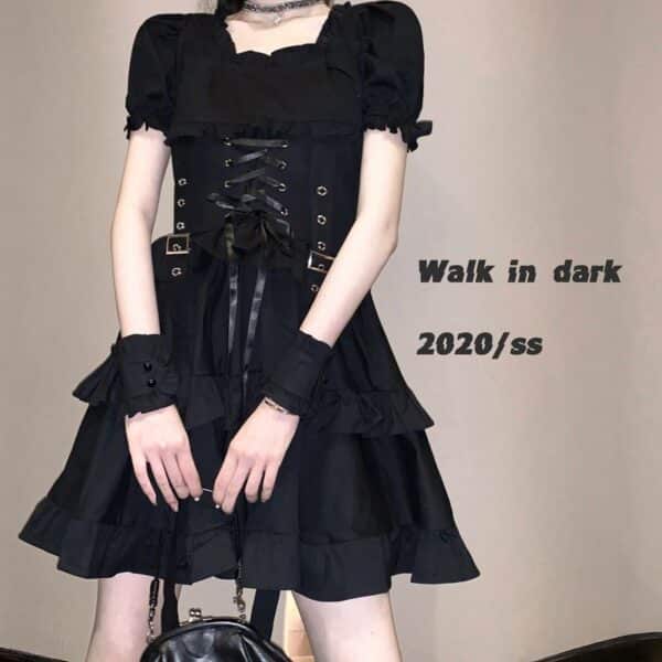 details of a Short Black Corset Dress with Wrist Cuffs