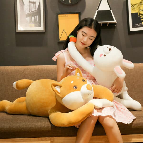 girl hugging dog and Rabbit Plushie