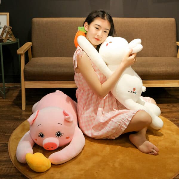 girl with pig and Rabbit Plush Toy