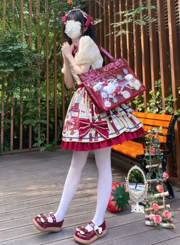 girl wearing Ita Bag Red Ita Purse