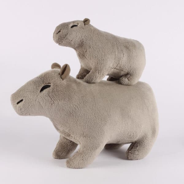 grey Capybara Stuffed Animals on top of each other