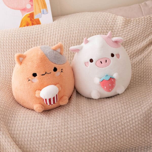 Pink Cow Squishmallow and kawaii cat squishmallow
