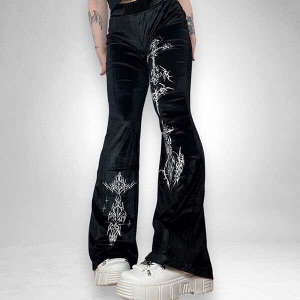 goth model wearing VELOUR Goth Pants flare style bell bottomed pants